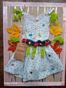Handmade blue floral fabric dress wall art with red roses and green moss - The Approved Dress by Vaselika Asenova